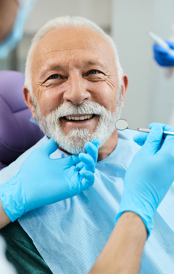 Smiling patient at dental office