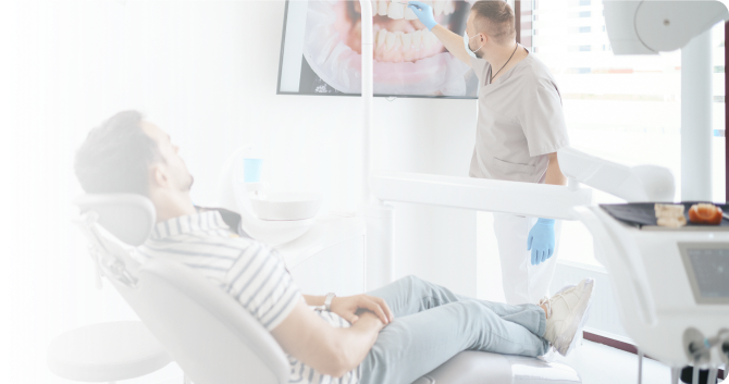 Dental consultation with patient in chair and dentist